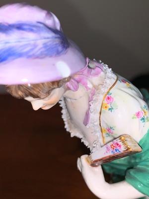 Porcelain figure of woman with shawl and hat, Meissen Crossed Swords Mark