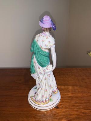 Porcelain figure of woman with shawl and hat, Meissen Crossed Swords Mark