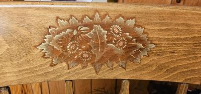 Antique rocker with painted design