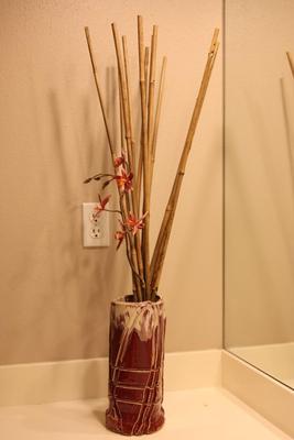 Pottery Vase and Bamboo Decor