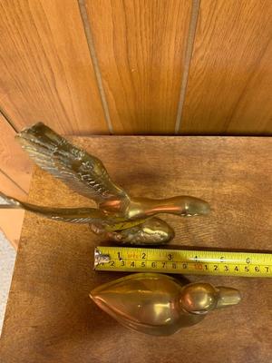 2 Small Vintage brass ducks. one landing and one swimming