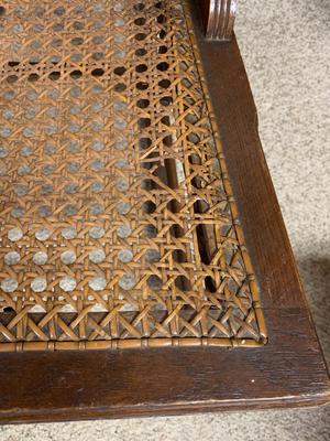 Antique caned rocking chair