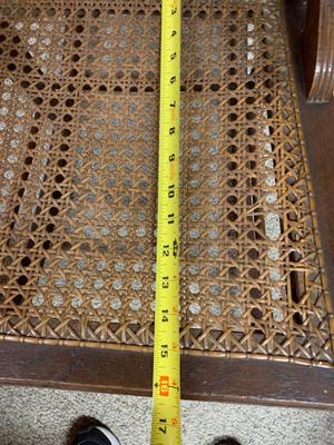 Antique caned rocking chair