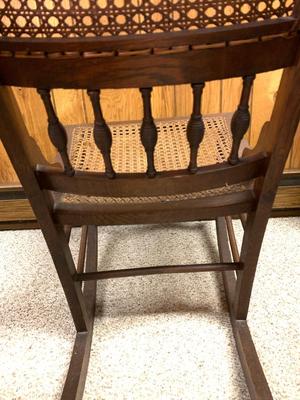 Antique caned rocking chair