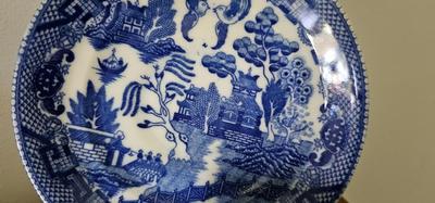Blue and white flow blue cup and saucer with stand