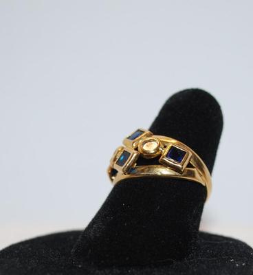 Size: 6 Synthetic Italian Square Blue Stones and Round Cubic Zirconia on Yellow/Gold Band (2.0g)