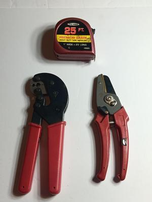 Cable Pliers - Cutters and a red Pro series 25-foot tape measure
