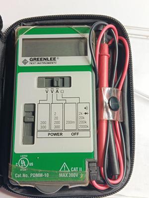 Greenlee Test Instrument Volt meter with case and a precision screwdriver set