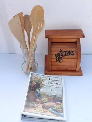 Wooden recipes box with vase of wooden utensils and a Pleasures from the good Earth cookbook