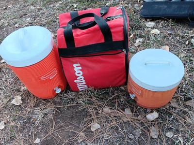 Wilson Soft sided cooler bag with two different sized Rubbermaid GOTT cooler beverage dispensers