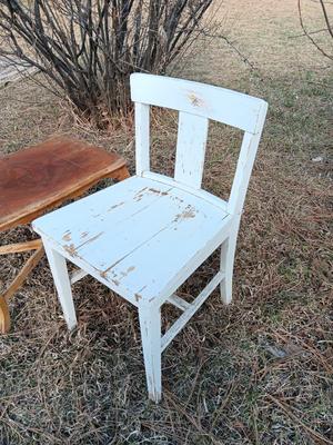 Antique wooden chair with small inlayed design top end table
