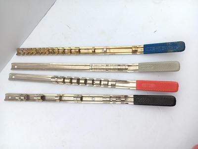Four Craftsman Socket Storage organizing rods