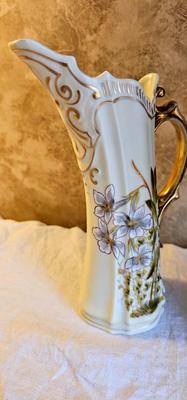 9" tall porcelain pitcher