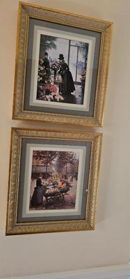 2 prints in gilt gold frames