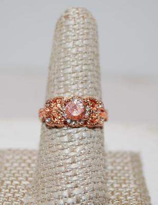Size 9 Pink Round Center Stone Ring with Pinkish Surrounds (4.5g)