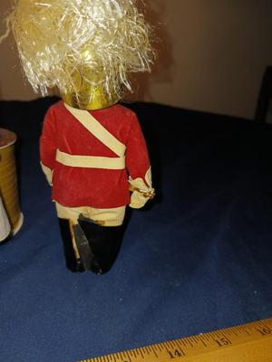 SLEEPY EYED PILGRIM LADY AND A BRITISH SOLDIER W/BRASS HELMET