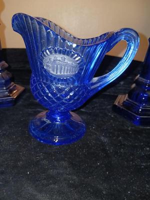 BLUE GLASS CANDLESTICKS, CREAMER AND RELISH DISH