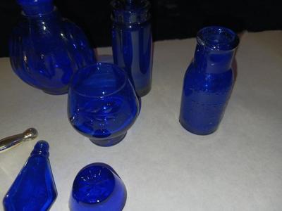 A COLLECTION OF BLUE GLASS