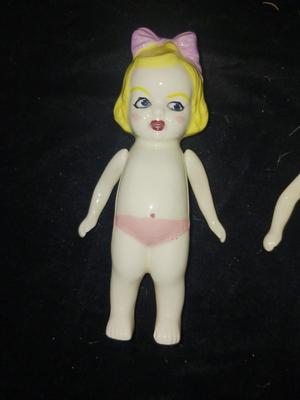 SLEEPY EYE DOLL AND 3 PORCELAIN DOLLS