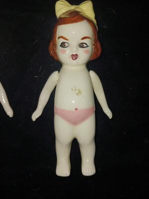 SLEEPY EYE DOLL AND 3 PORCELAIN DOLLS