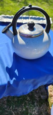 White ceramic teapot