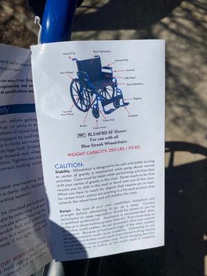 NEW WHEELCHAIR AND A SHOWER SEAT