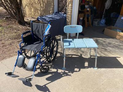 NEW WHEELCHAIR AND A SHOWER SEAT
