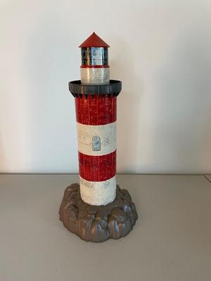 Two Lighthouses - One Plastic and One Cardboard