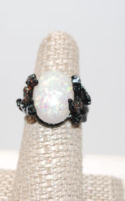 Size 7 Â¼ Silver Plated .925 Flowered Black Band with Oval Fire Opal (7.2g)