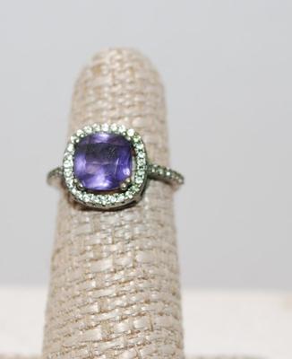 Size 5 Â¼ Purple Faceted 4 Prong Center Stone with Small Stones Surround (2.4g)