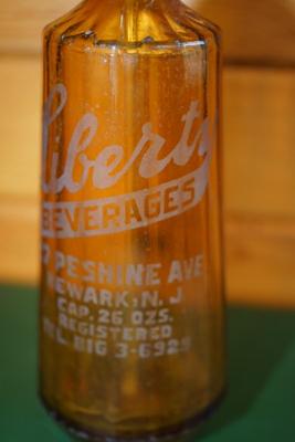 ANTIQUE SELTZER BOTTLE AMBER "LIBERTY BEVERAGE" 12"