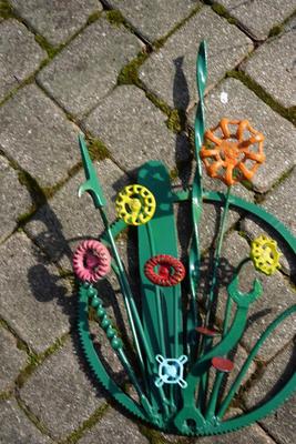HAND CRAFTED GARDEN SCULPTURES MADE FROM TOOLS AND FAUCET VALVES