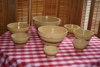 ANTIQUE YELLOW WARE NESTING STONEWARE BOWL SET W/BROWN BANDED. 14" TO 5"