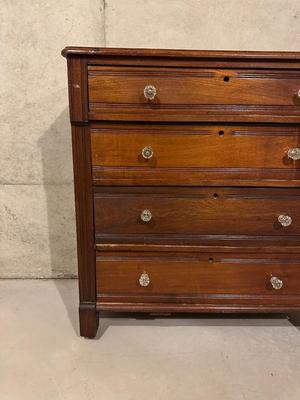ANTIQUE 4 DRAWER CHEST WITH GLASS KNOBS ON WOODEN WHEELS