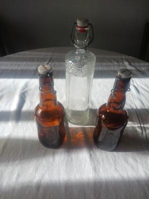 VINTAGE LIQUOR BOTTLE FROM GERMANY AND 2 GROLSCH BEER BOTTLES WITH CLAMP TOPS