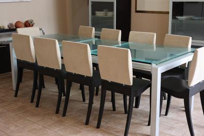 LIGNE ROSET Extendable Glass Table with Ten Dining Chairs