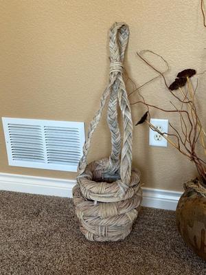 CLAY POT WITH FAUX FOLIAGE AND UNIQUELY WEAVED BASKET