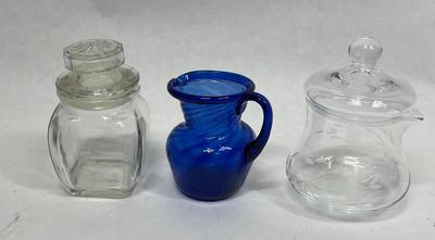 Lot of 3 small Glass Containers - a pitcher, a jelly jar, and a small canister cobalt & clear