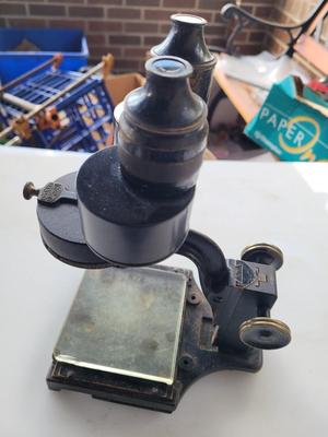 Vintage Spencer Buffalo Iron and brass microscope with original box