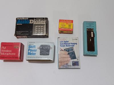 Assortment of new in the box vintage small electronics - Microphone - Multimeter - D.C. Motor - and more