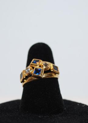 Size: 6 Synthetic Italian Square Blue Stones and Round Cubic Zirconia on Yellow/Gold Band (2.0g)