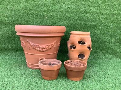 141 Lot of 4 Terracotta Planters