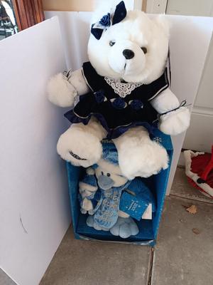 Collectible annual Christmas bear plush and penguin Millennial years.