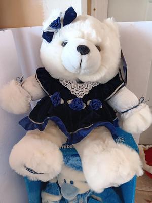 Collectible annual Christmas bear plush and penguin Millennial years.