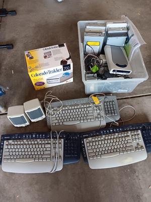 Assortment of computer keyboards and drives and other Computer accessories