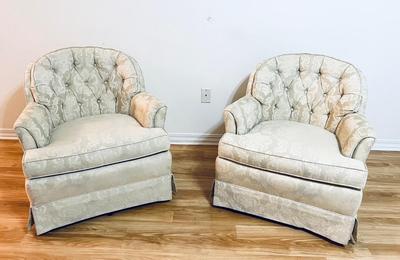 Two Swivel Rocking Chairs