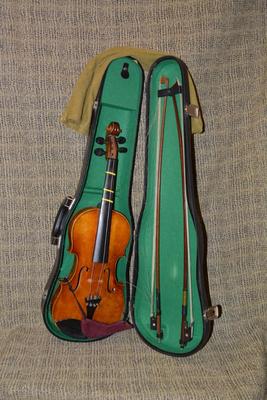 Sale Photo Thumbnail #691: Made in West Germany. Needs strings, but includes extra bridge and 2 bows. Case has some damage. 23.5"
