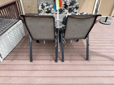PATIO TABLE WITH UMBRELLA AND 4 PATIO CHAIRS WITH CUSHIONS