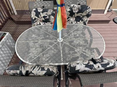 PATIO TABLE WITH UMBRELLA AND 4 PATIO CHAIRS WITH CUSHIONS