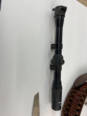 Neat Tasco Scope, with a Nifty Leather Ammo Belt. , and a Folding Saw